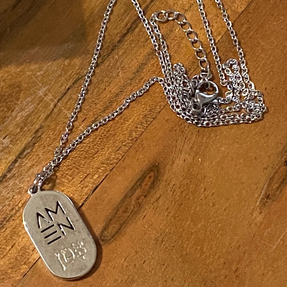 “AMEN” engraved silver toned necklace. New in box